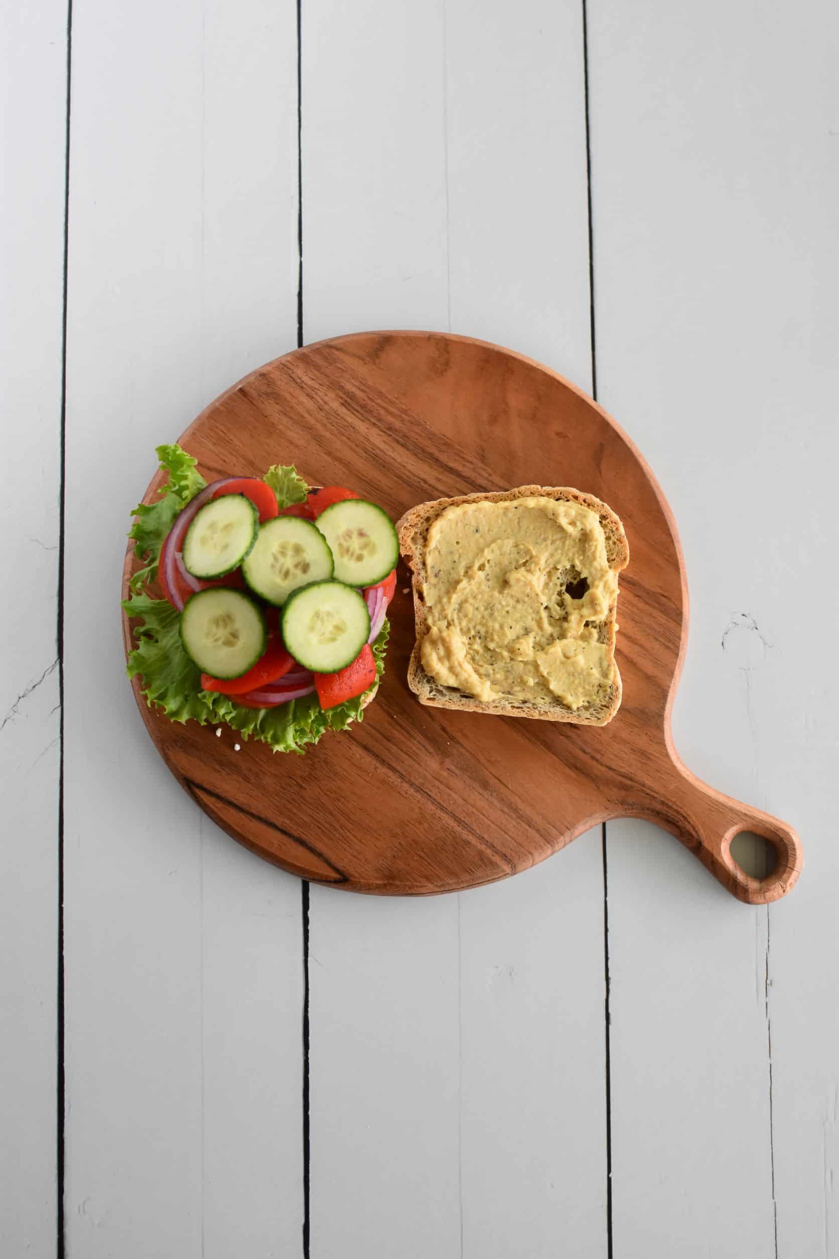 cucumber slices added to one side of toast.