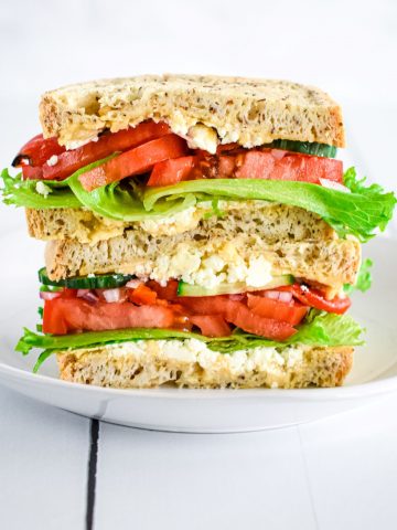 close-up of two halves of sandwich stacked on top of each other.