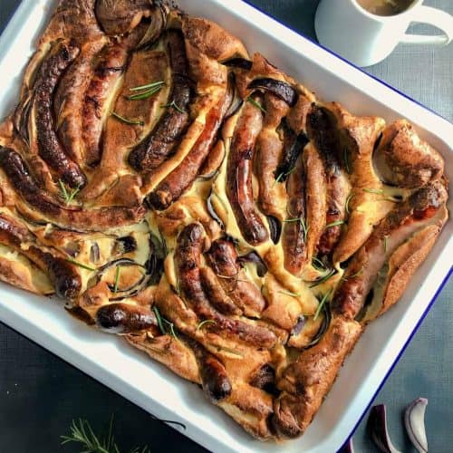 overhead of vegan toad in the hole in baking dish after cooking.