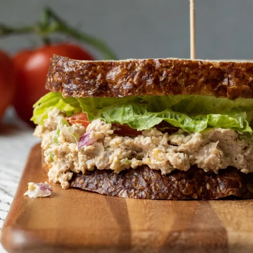 close-up front view of vegan tuna salad sandwich.