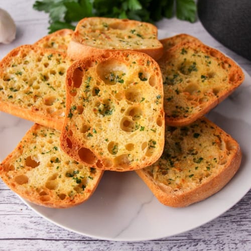 Air fryer garlic bread hero on a plate.