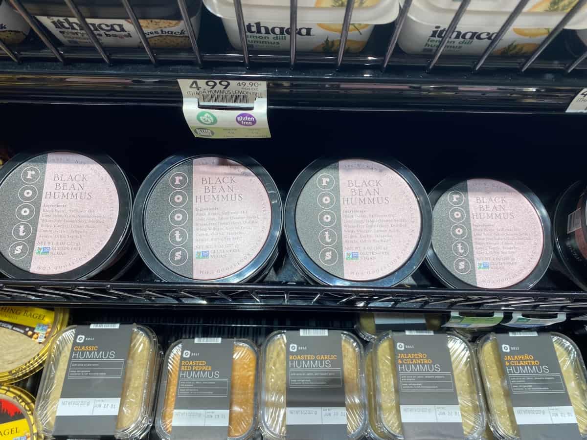 Black bean hummus on a supermarket shelf.