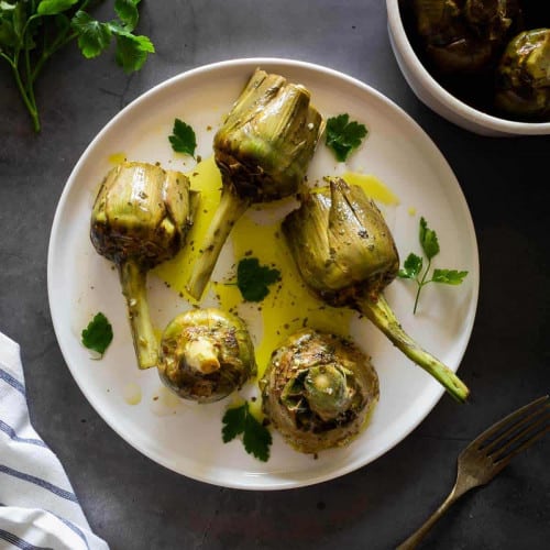 Roman-Style Artichokes on a plate.