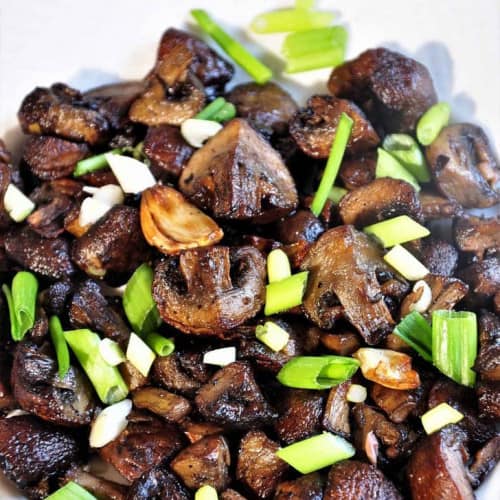 Air fryer mushrooms on a plate.