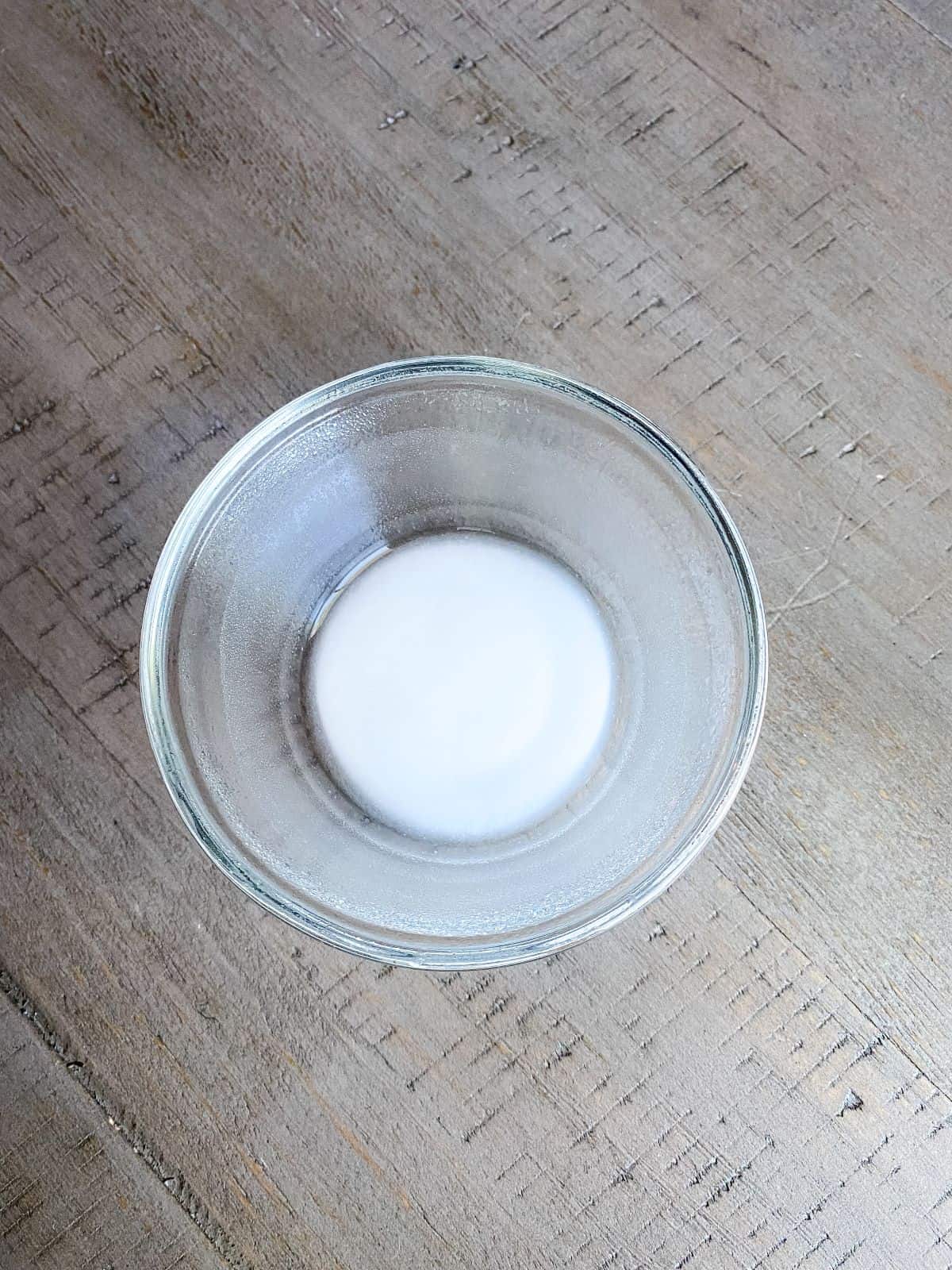 Vinegar and baking soda egg substitute in bowl.