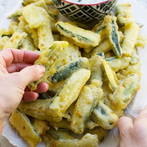 Zucchini fries on a plate.