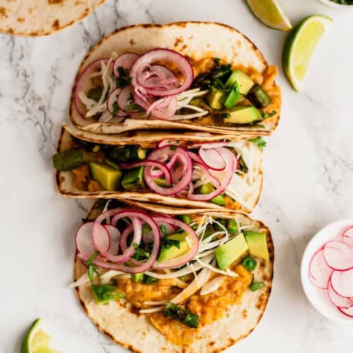 Vegan Tacos on a marble surface.