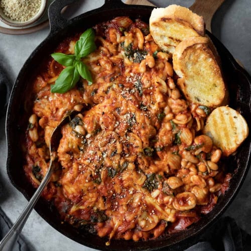 One pot vegan Tuscan white bean skillet in a skillet.