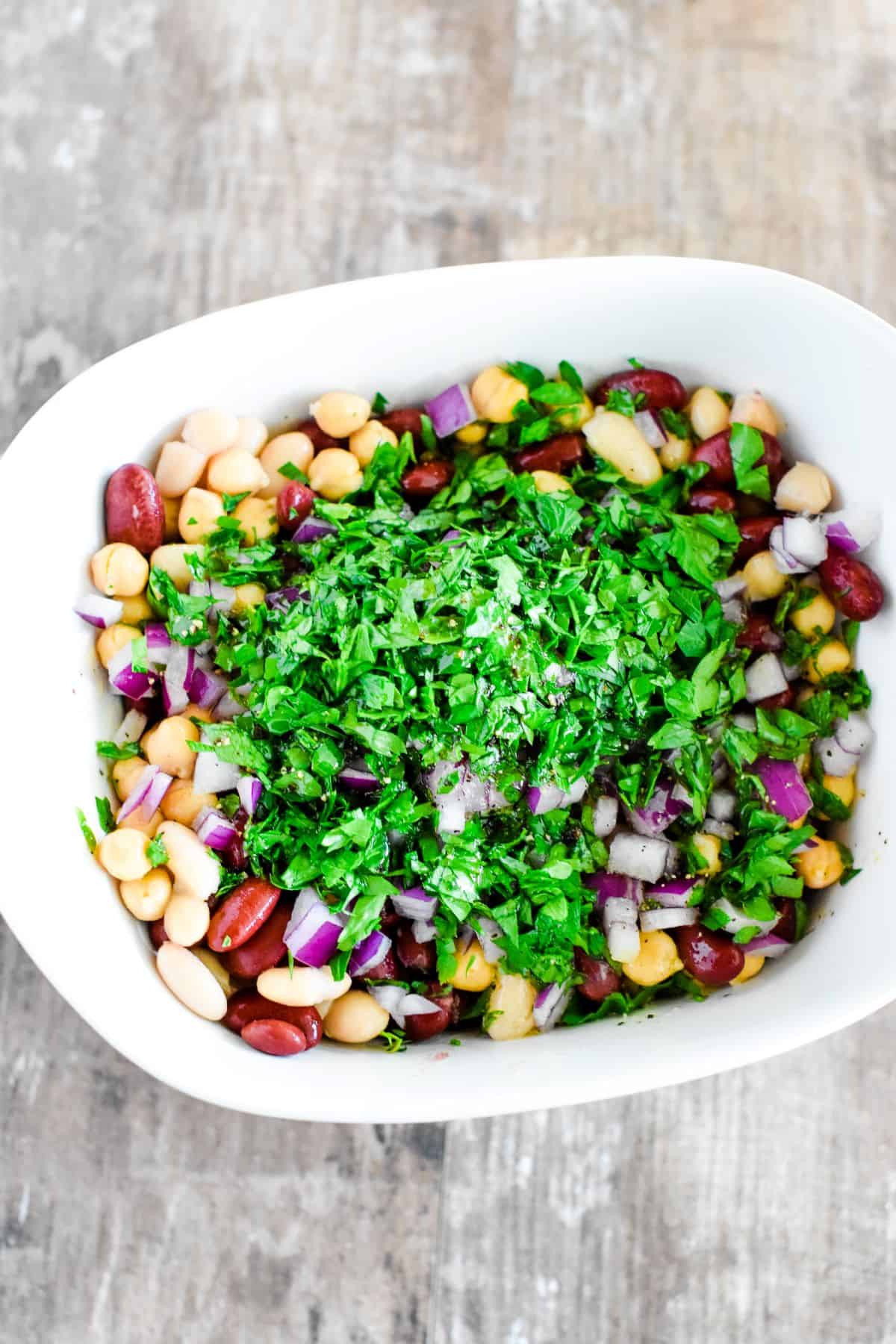 bean salad in serving dish after parsley and seasonings were added.