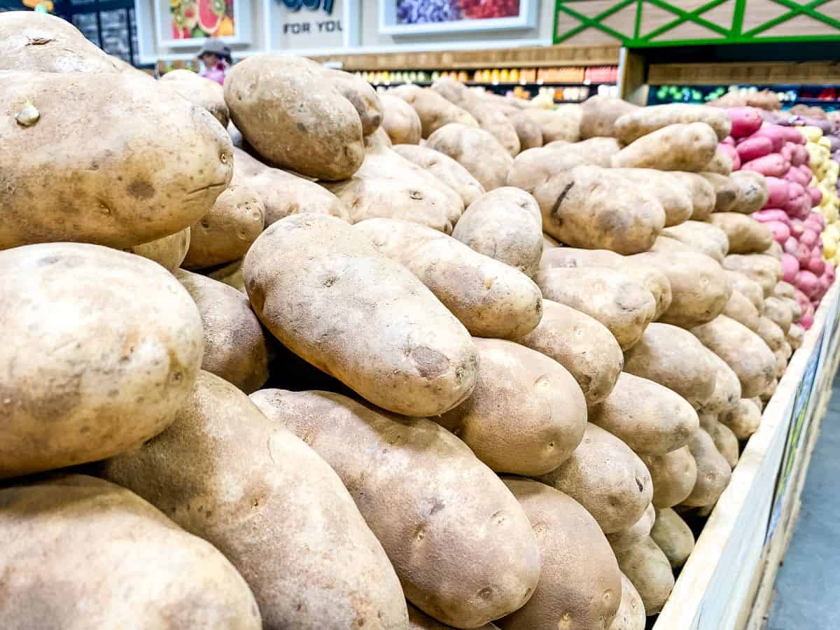 Different types of spuds displayed in the supermarket