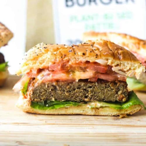 Air fryer beyond burger on a cutting board.