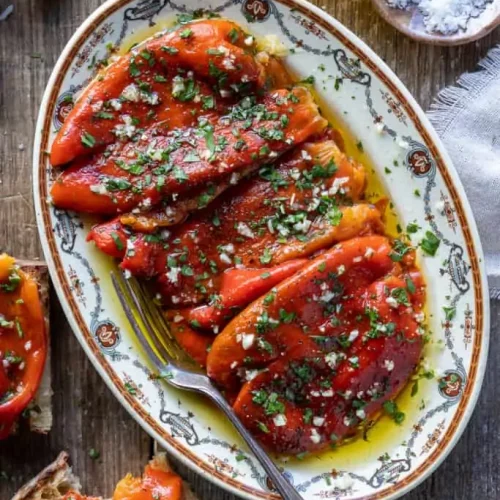 Chargrilled capsicums on a plate.