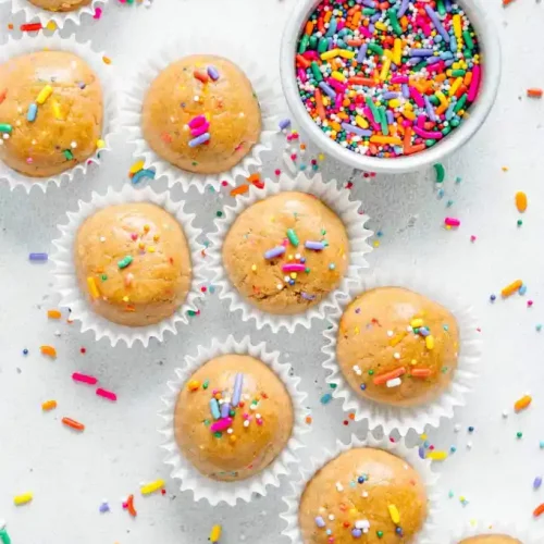 Vegan Funfetti Cake Protein Bites in wrappers.