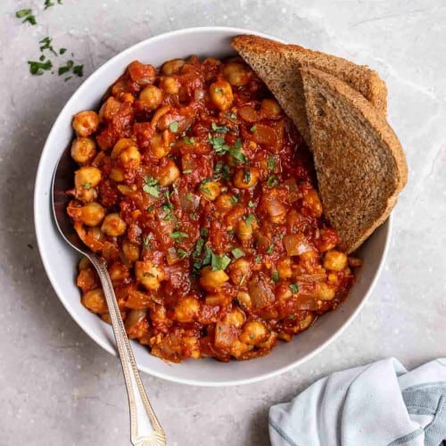 Chickpeas in tomato sauce in a bowl.