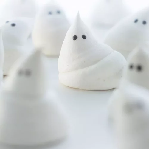 Meringue Ghosts on a surface.