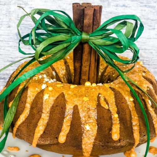 Vegan Pumpkin Cake with Cream Cheese Filling on a plate.