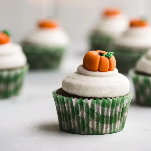 Vegan Pumpkin Cupcakes in cupcake wrappers.