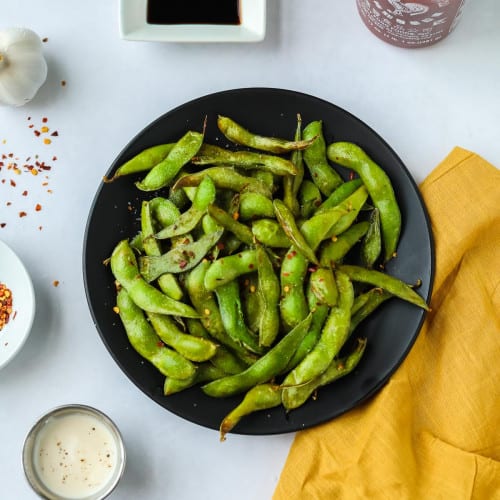 Air Fryer Edamame on a plate.