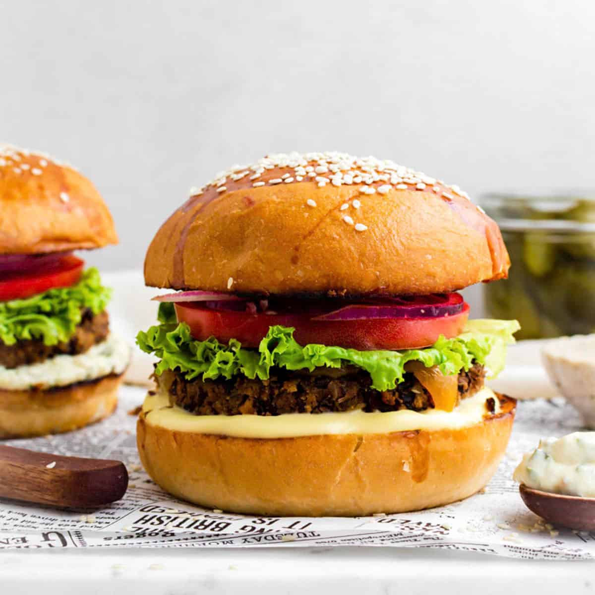 Chili's vegetarian option:  black bean burger placed on a marble board lined with parchment paper.