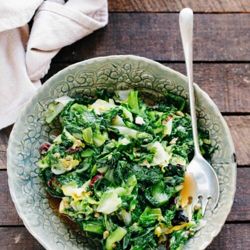 Escarole with Olives and Capers in a bowl with a fork.