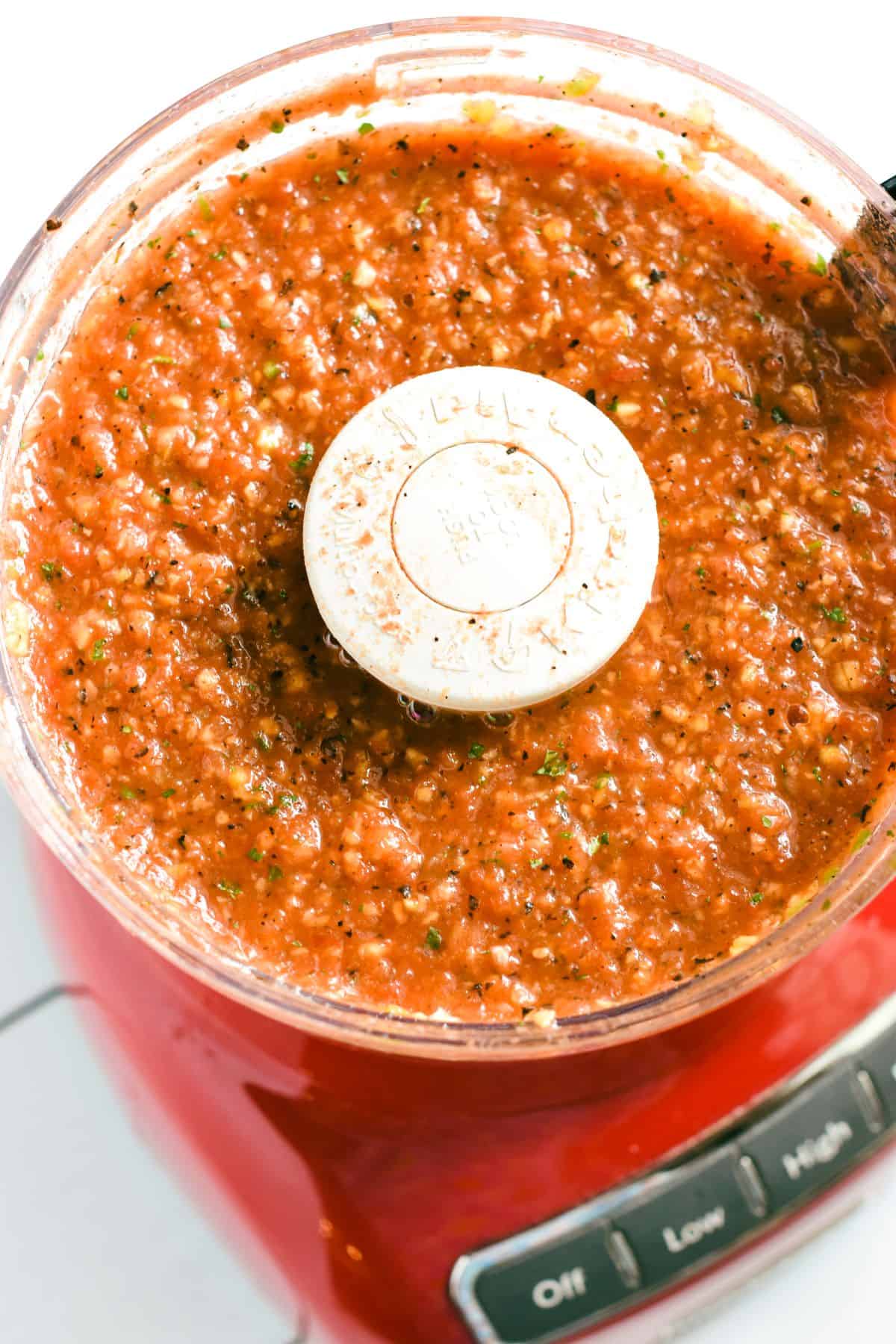 salsa in food processor after blending in the tomatoes.