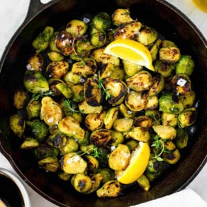 Frozen brussels sprouts cooked in a cast-iron skillet, and topped with flaky sea salt and fresh thyme.