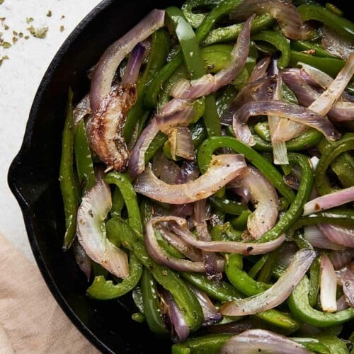 Chipotle fajita veggies in a cast-iron skillet.