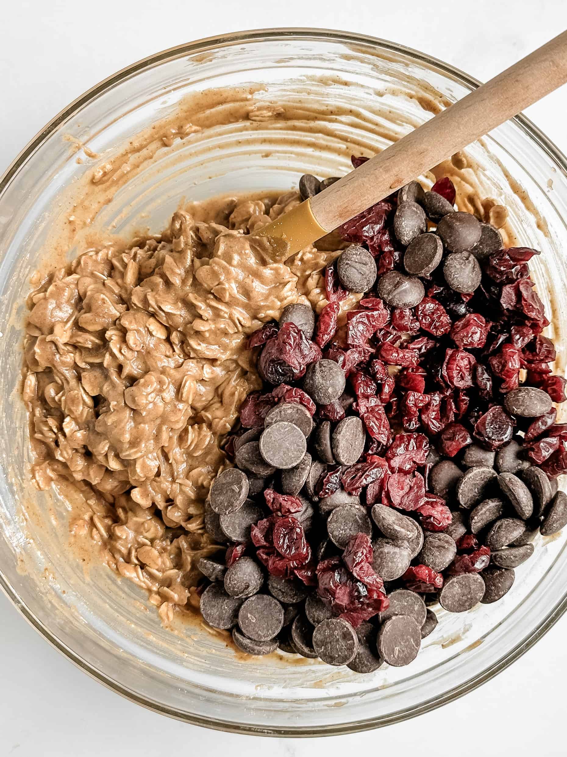 Oatmeal dough with chocolate and cranberries.