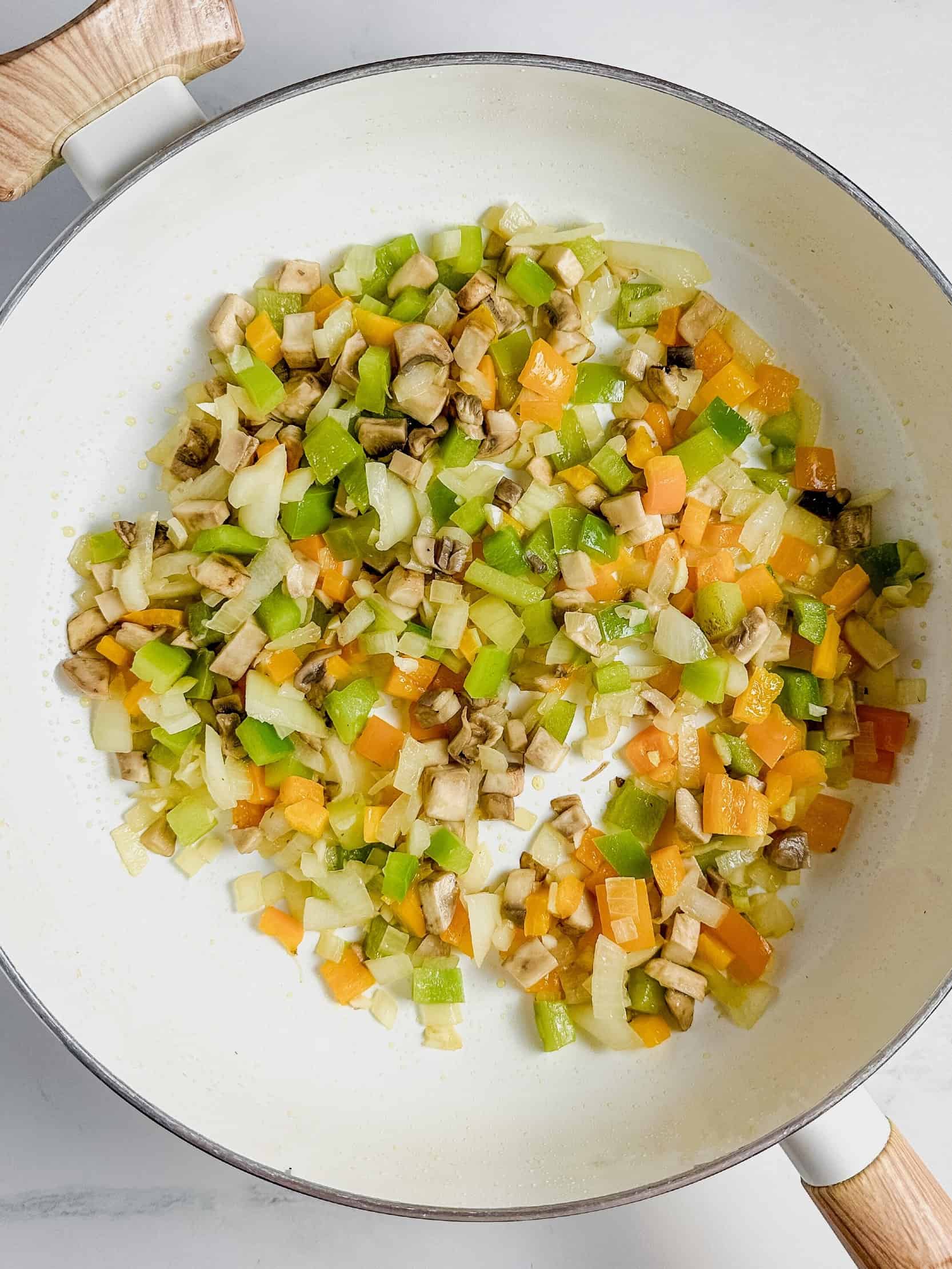 Chopped veggies in skillet.