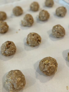 Oatmeal dough balls on parchment paper