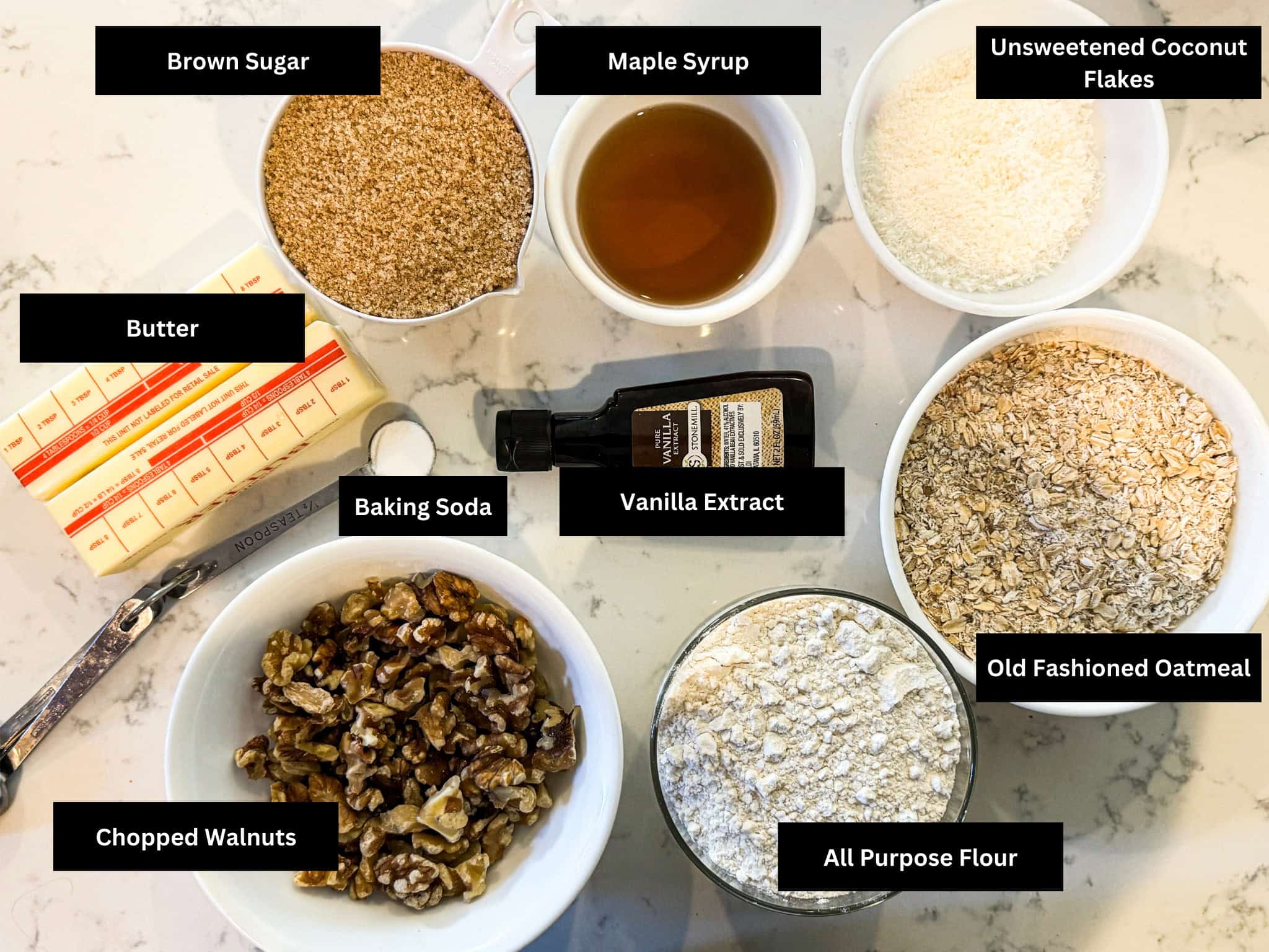 Main Ingredients on a table to make oatmeal coconut walnut cookie recipe