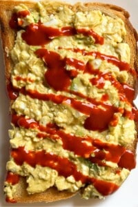 Avocado and Cottage Cheese Mix spread on a buttered toast