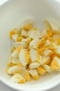 Diced Hard boiled eggs in a white bowl