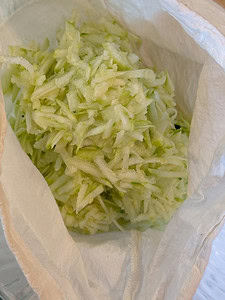 Shredded Zucchini in a cheesecloth