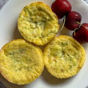 Step 3: Final Product - 3 egg bites served on a plate with 3 cherries