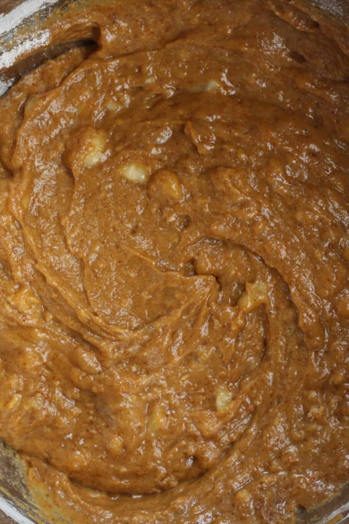 Mix in the dry and wet ingredients to form the pumpkin bread batter