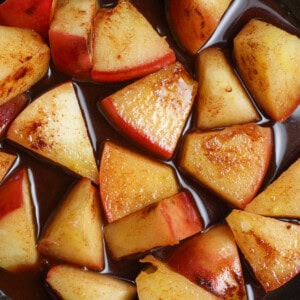 Step 2 of making cinnamon apples - mixed cinnamon, nutmeg and maple syrup