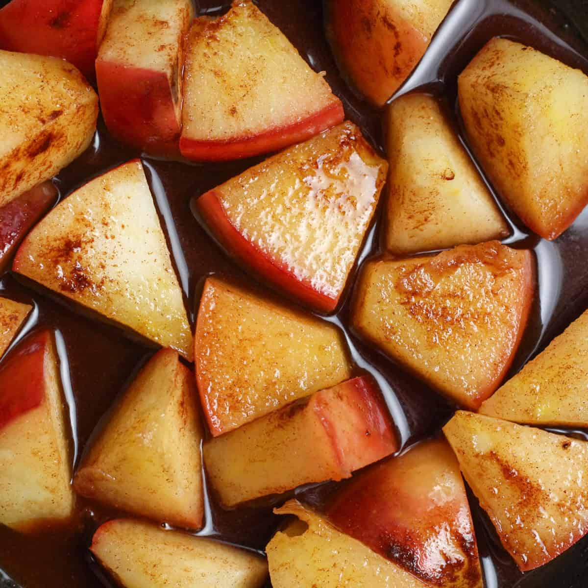 Step 2 of making cinnamon apples - mixed cinnamon, nutmeg and maple syrup 